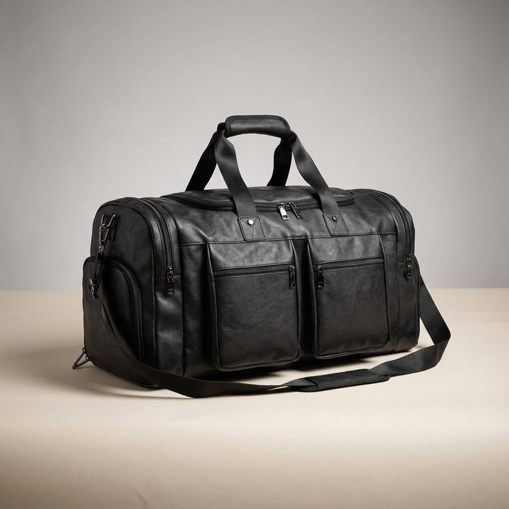 Functional leather overnight bag, a spacious unisex duffel with a handy shoe compartment for short trips.