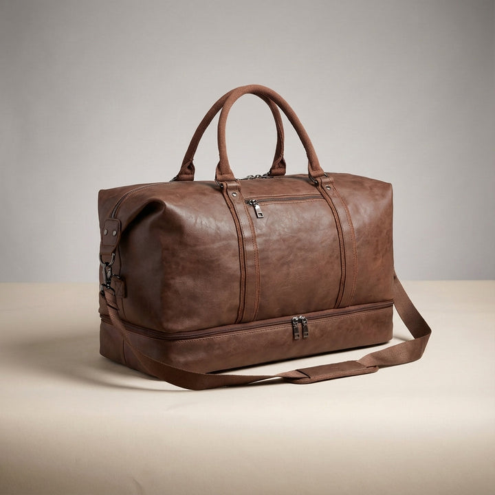 Genuine leather spacious weekend bag, a practical unisex travel duffel with a separate compartment for shoes.