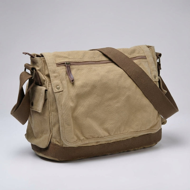 Spacious vintage canvas messenger bag for students or commuters, ideal for carrying books, laptop, & essentials.
