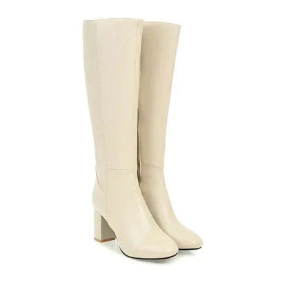 "Stivali al ginocchio da donna con tacco robusto, ecopelle elegante, chiusura zip laterale, perfetti per ogni occasione."