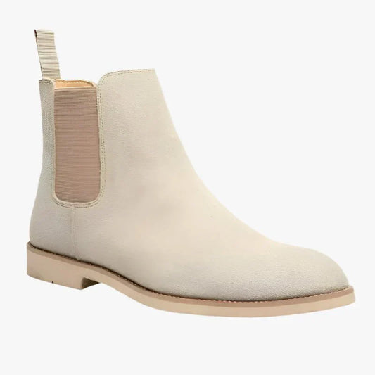 "Stivali Chelsea uomo eleganti in pelle e suede beige, design senza tempo adatto per ogni occasione."