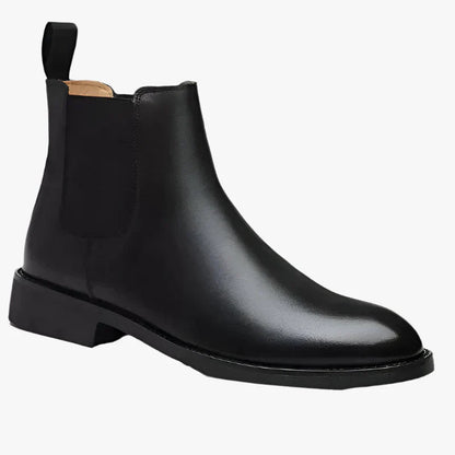 "Stivali Chelsea uomo eleganti in pelle e suede beige, design senza tempo adatto per ogni occasione."