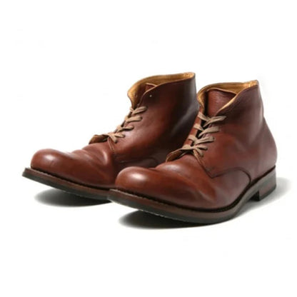 Stivali classici da uomo marrone e nero, eco-friendly, punta a mandorla, finitura liscia, elegante e versatile.