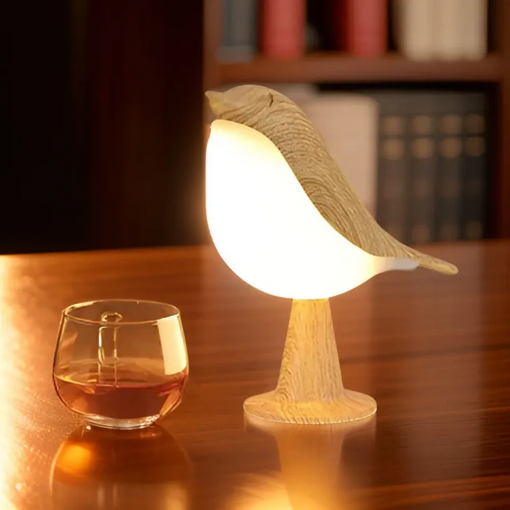 FeatherGlow LED bird lamp, decorative and rechargeable, offering mood lighting & aromatherapy.