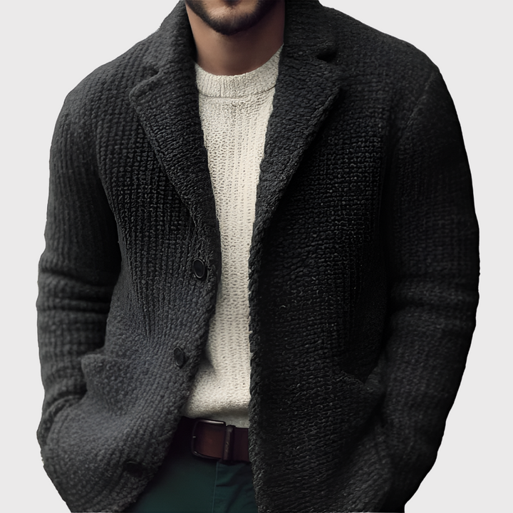 Soft knit men's cardigan blazer featuring a button-front design and long sleeves for comfortable, stylish wear.