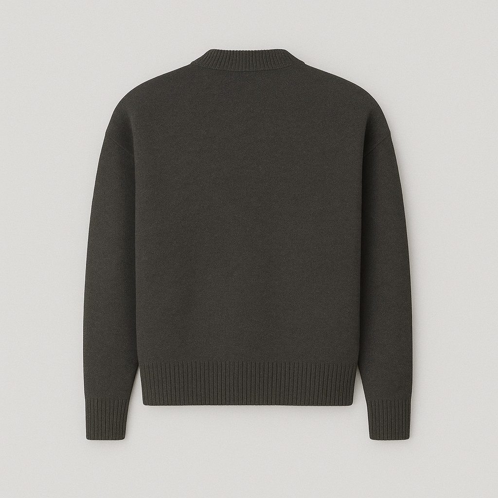 Modern men's fashion: An oversized crew neck sweater with a distinct heart motif, offering stylish comfort.