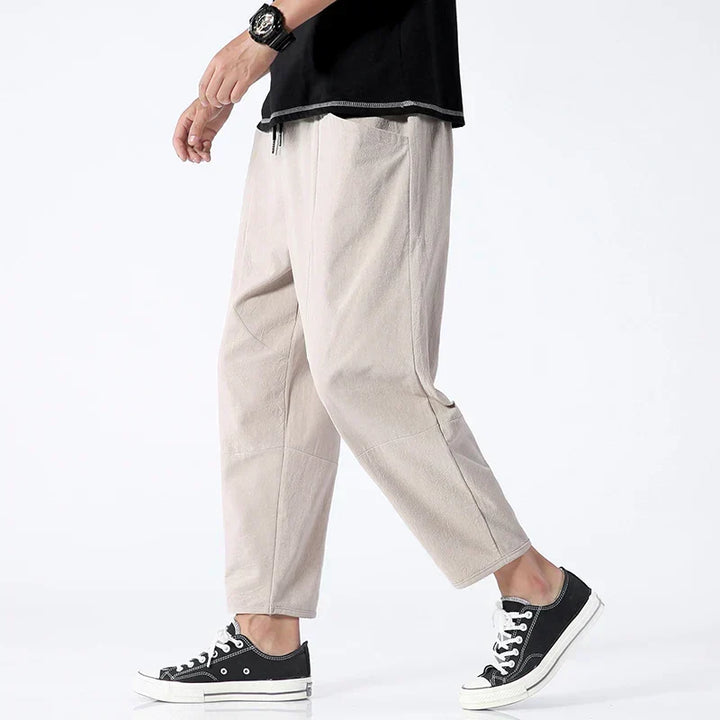 Comfortable men's cropped drawstring pants. Tapered fit for relaxed casual wear, perfect easy-fit summer trousers.