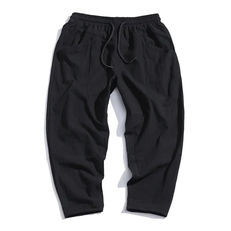 Relaxed fit men's cropped pants, tapered and comfortable. Perfect for stylish everyday or summer casual wear.