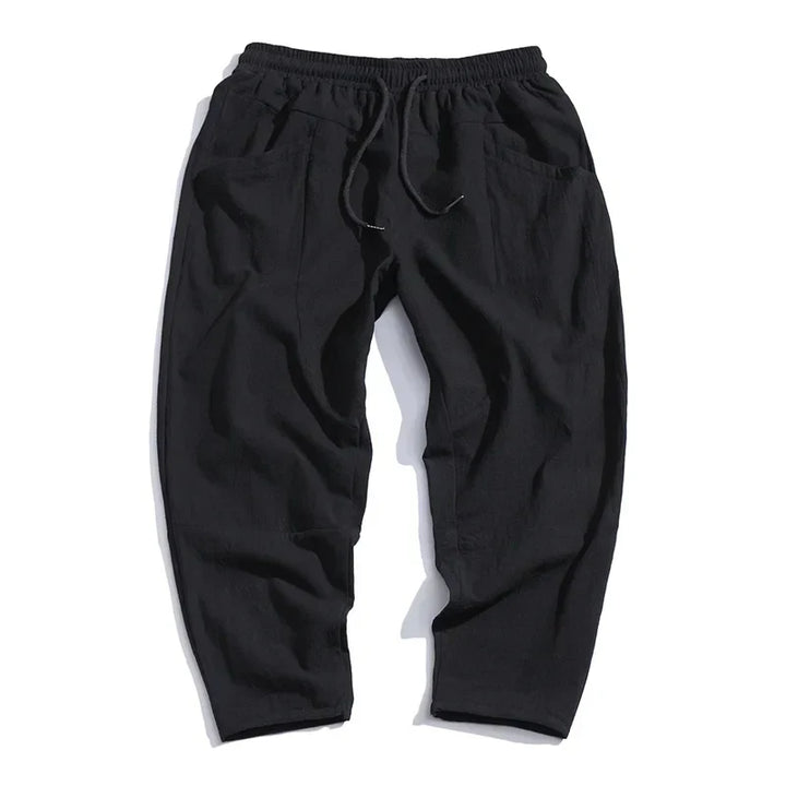 Relaxed fit men's cropped pants, tapered and comfortable. Perfect for stylish everyday or summer casual wear.