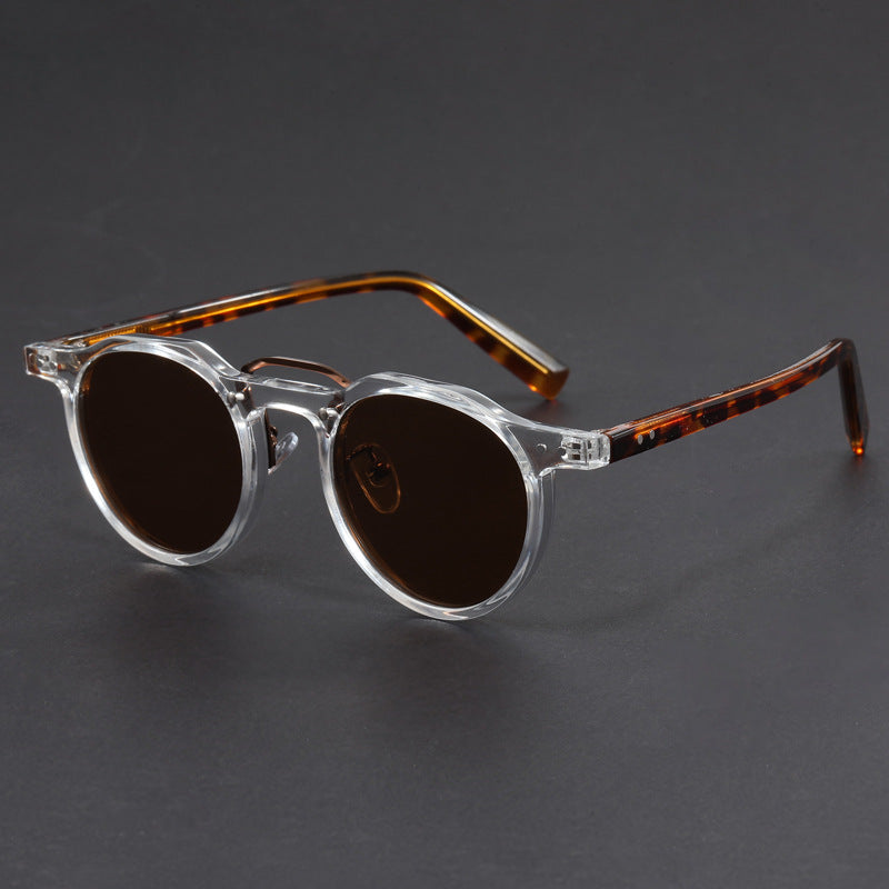 Stylish unisex sunglasses with UV400 protection, black frame & lenses, perfect for fashion and eye comfort.