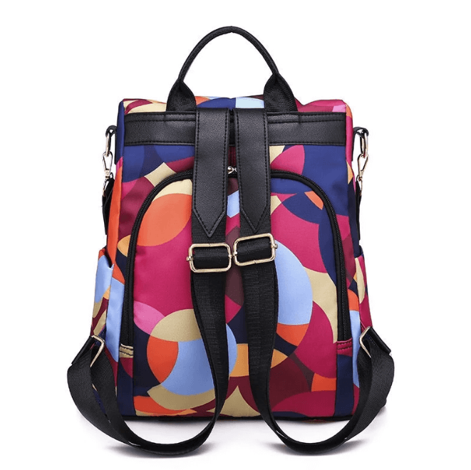 Compact women's anti-theft travel backpack, water-resistant & secure, a stylish small daily use shoulder bag.