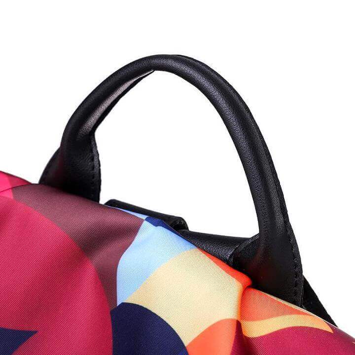 Water-resistant PU leather women's backpack, anti-theft design, perfect as a stylish travel or daily shoulder bag.
