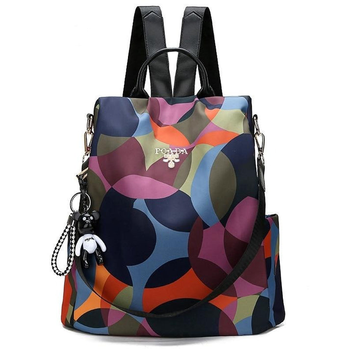 Stylish women's anti-theft backpack made from water-resistant oxford fabric, perfect for travel & daily commute.