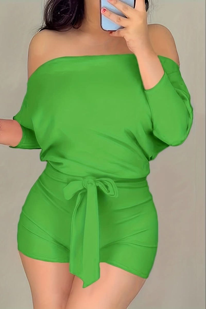 Woman walking in a comfortable batwing jumpsuit, perfect for effortless daily wear & chic summer style.