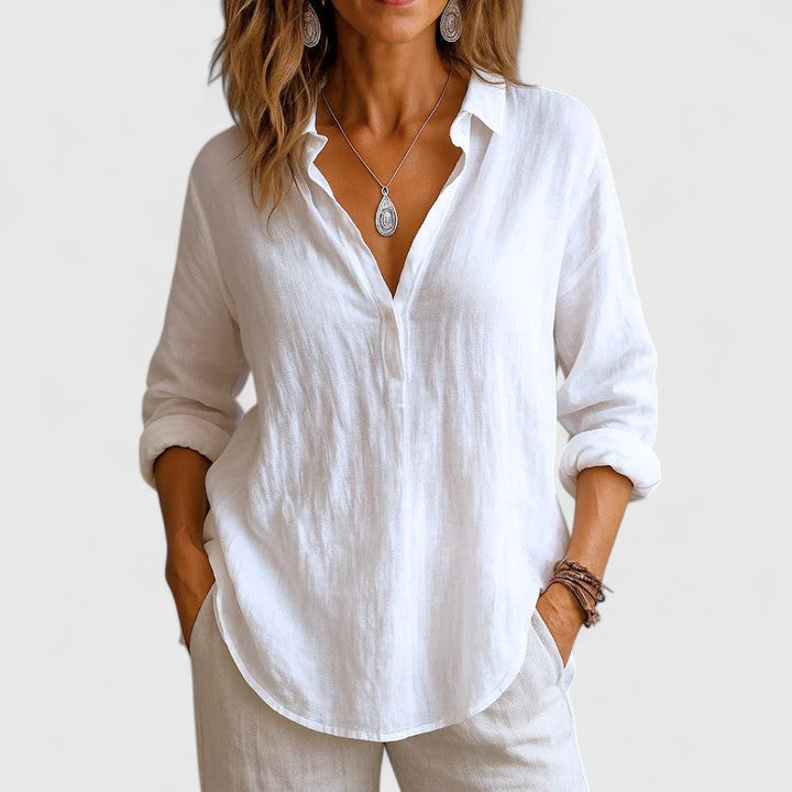 Comfort fit women's long sleeve blouse, ideal for spring/summer everyday fashion. Versatile & elegant top.
