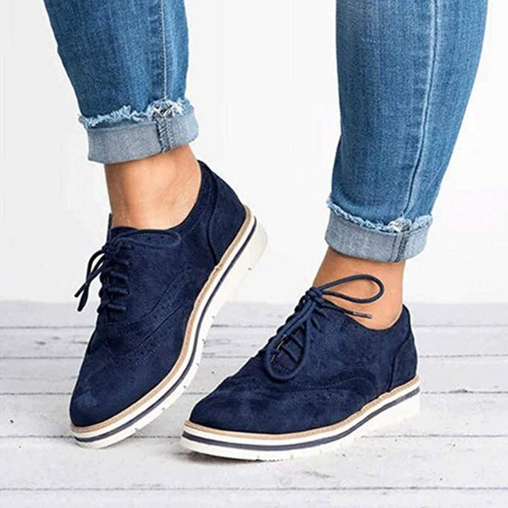 Fashionable women's brogue lace-up walking shoes, offering classic oxford style and everyday comfort.