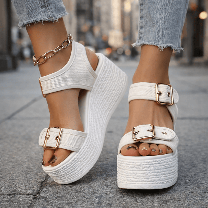 Women's adjustable buckle wedge sandals, offering effortless comfort & secure fit for summer.