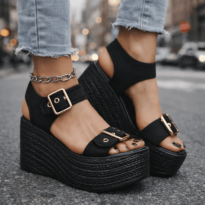 Women's comfortable buckle wedge sandals for effortless summer style, featuring adjustable straps.