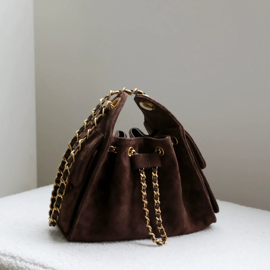 Genuine leather bucket shoulder bag for women, a timeless everyday handbag crafted from real leather.