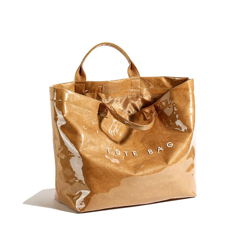 Durable women's everyday tote bag with a sleek high-gloss finish. Perfect for daily essentials & versatile use.