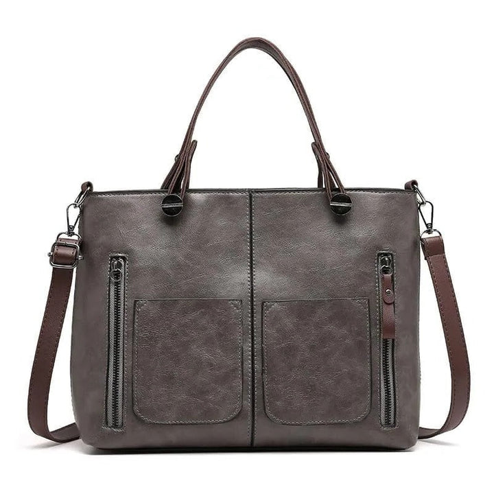 Organized multi-pocket leather shoulder bag for women, a stylish and practical tote.
