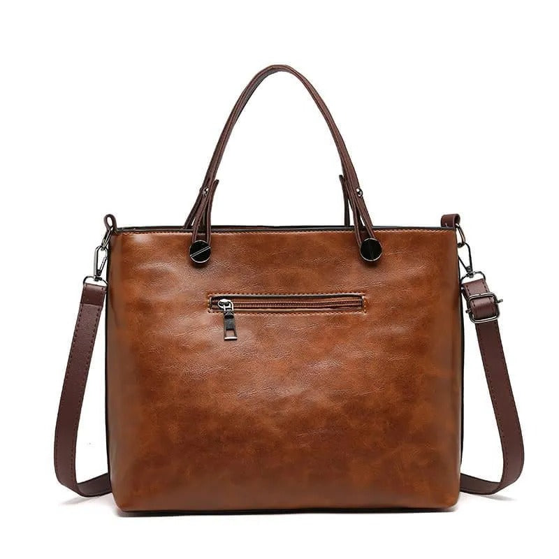 Durable leather tote bag for women with multiple pockets, an organized and stylish everyday purse.