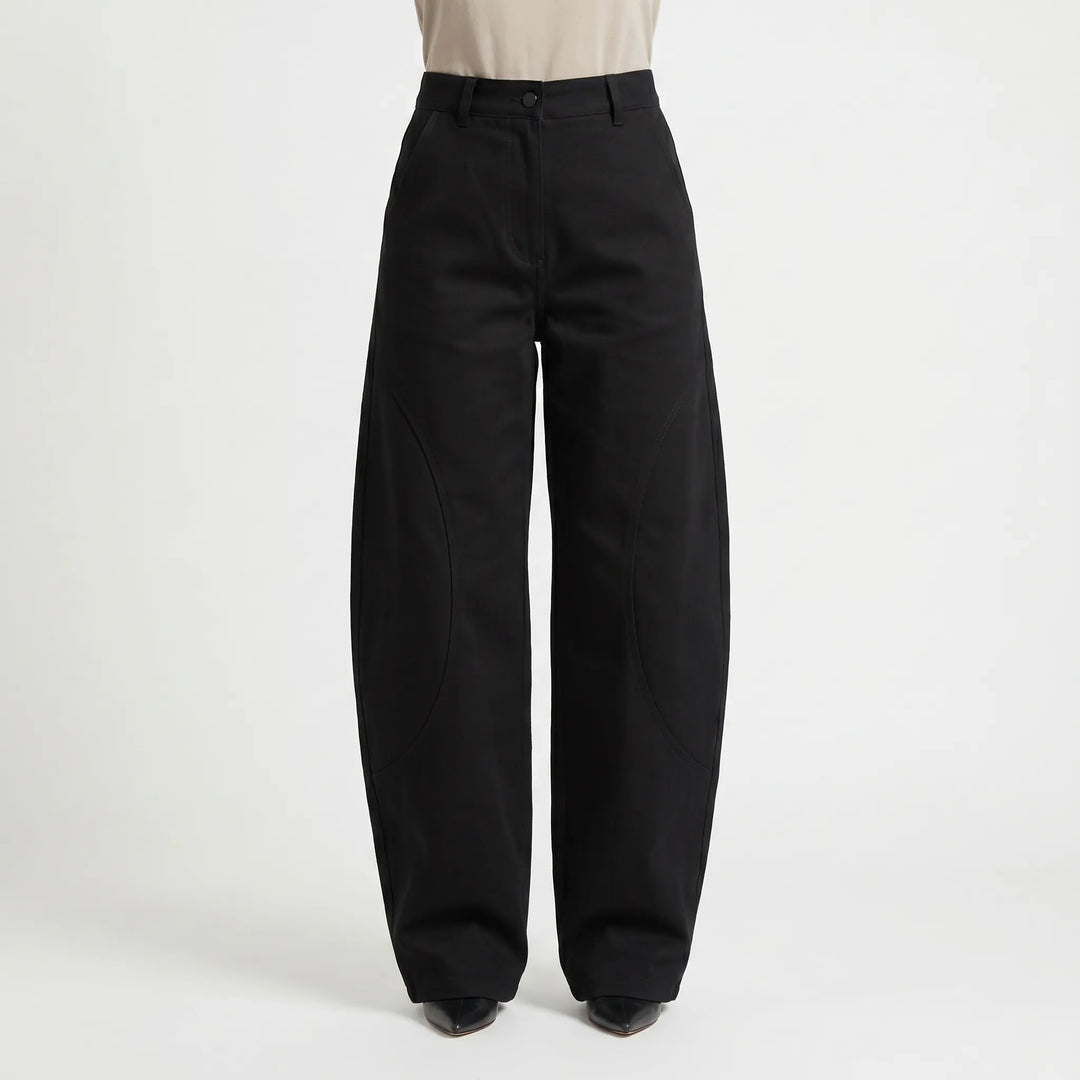 Women's low-rise barrel-leg jeans, offering a loose, comfortable fit and unique silhouette for modern streetwear.