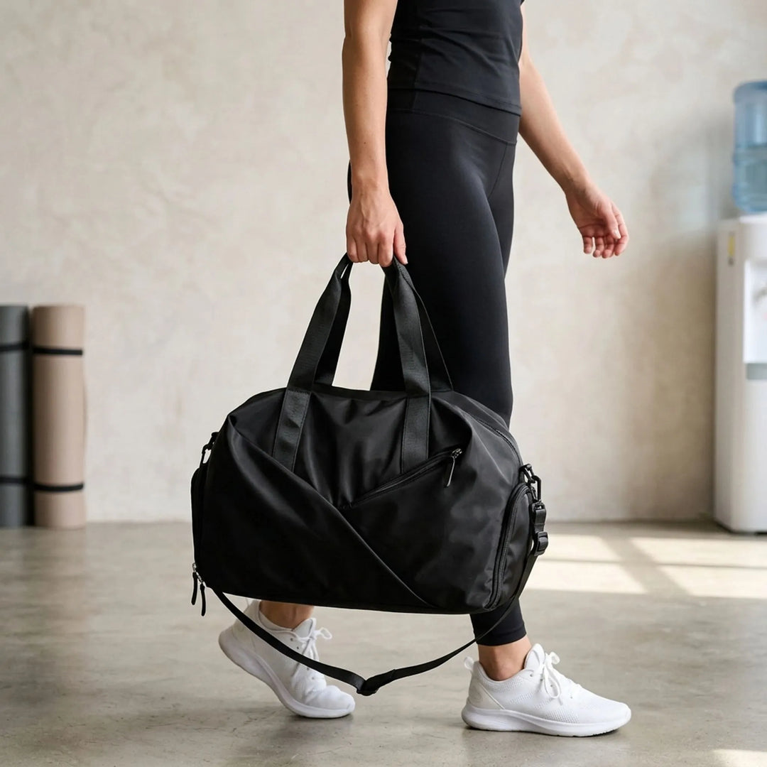 Stylish women's multifunctional gym duffel bag with shoulder strap, ideal for sports, travel, and weekend trips.