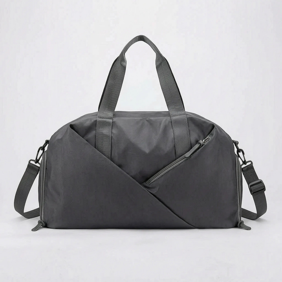 Durable women's athletic duffel bag, waterproof and lightweight, great for gym, yoga, or a quick getaway.