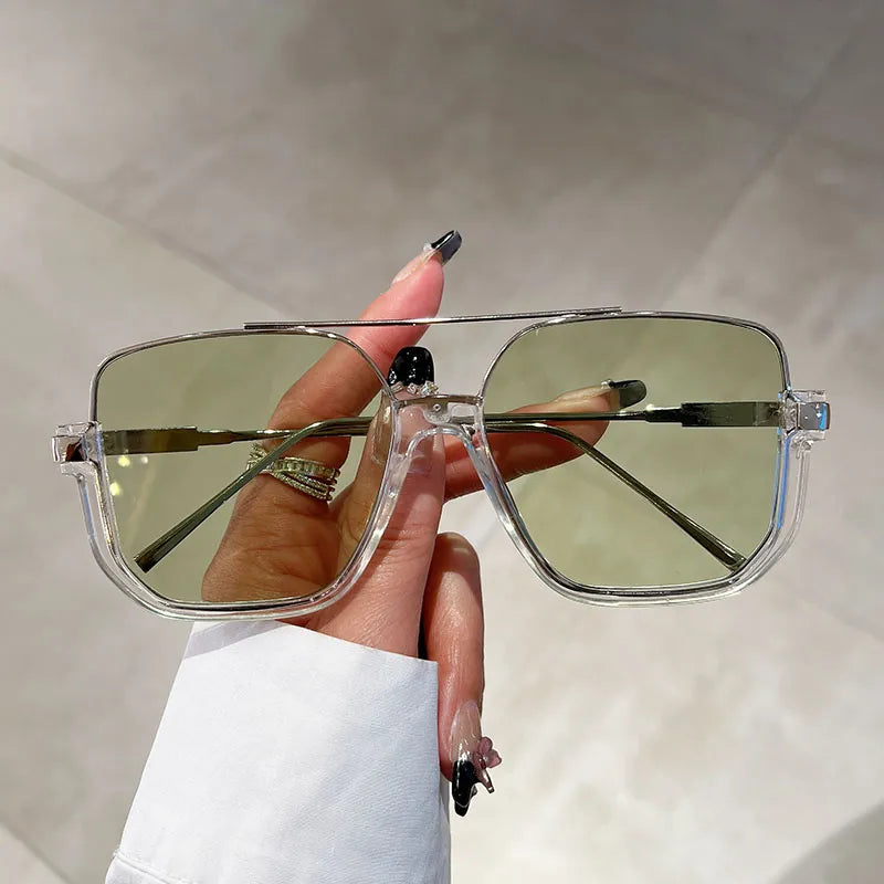Chic women's oversized square UV400 sunglasses. A stylish fashion accessory for ultimate eye protection.