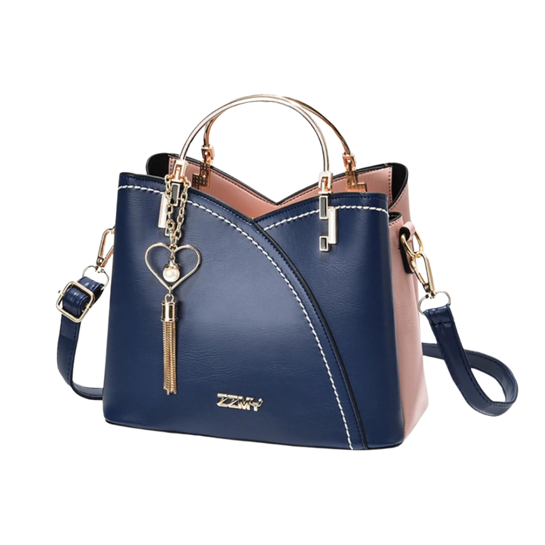 Elegant women's patchwork tote bag with playful tassel charm. A stylish and practical handbag for everyday carry.
