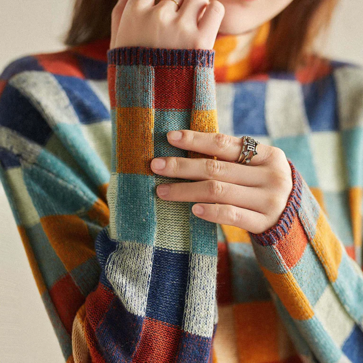 New arrival: Women's cozy patchwork turtleneck top. Elegant comfort for winter outfits.