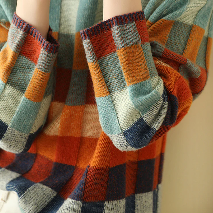 Unique patchwork design on a women's turtleneck top, perfect for stylish fall and winter outfits.