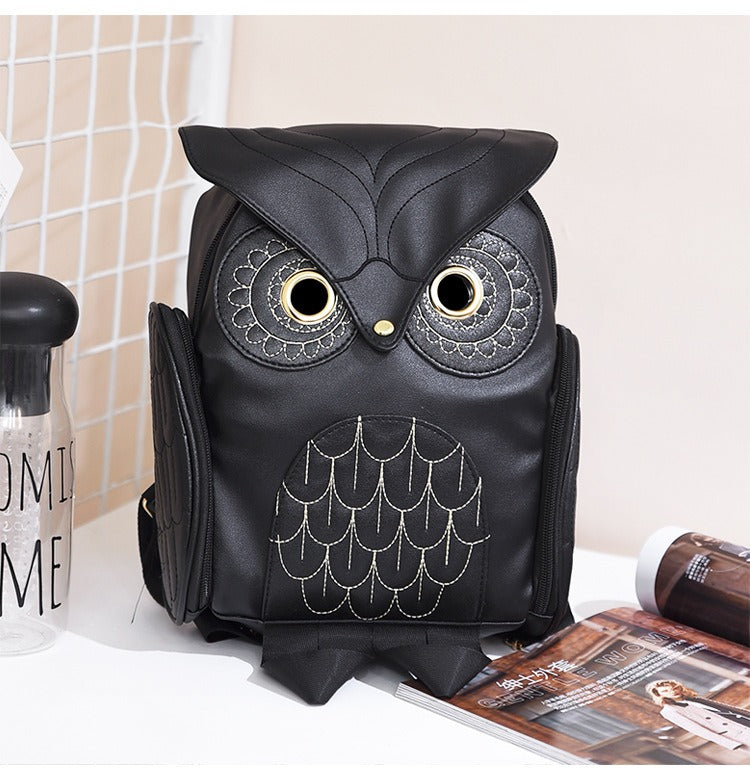 Stylish women's PU leather backpack with playful owl print and multiple pockets for daily essentials.