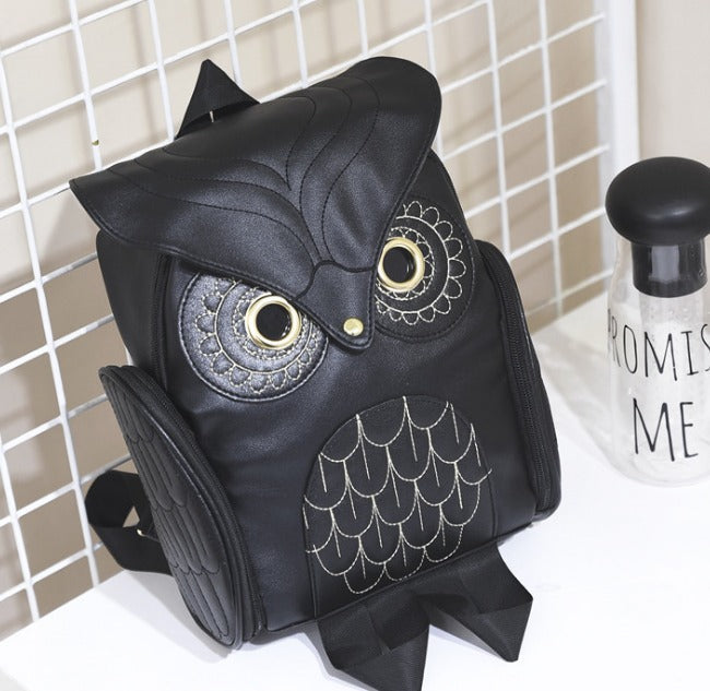 Back view of a chic women's PU leather owl print backpack, perfect for fashion-forward carrying.
