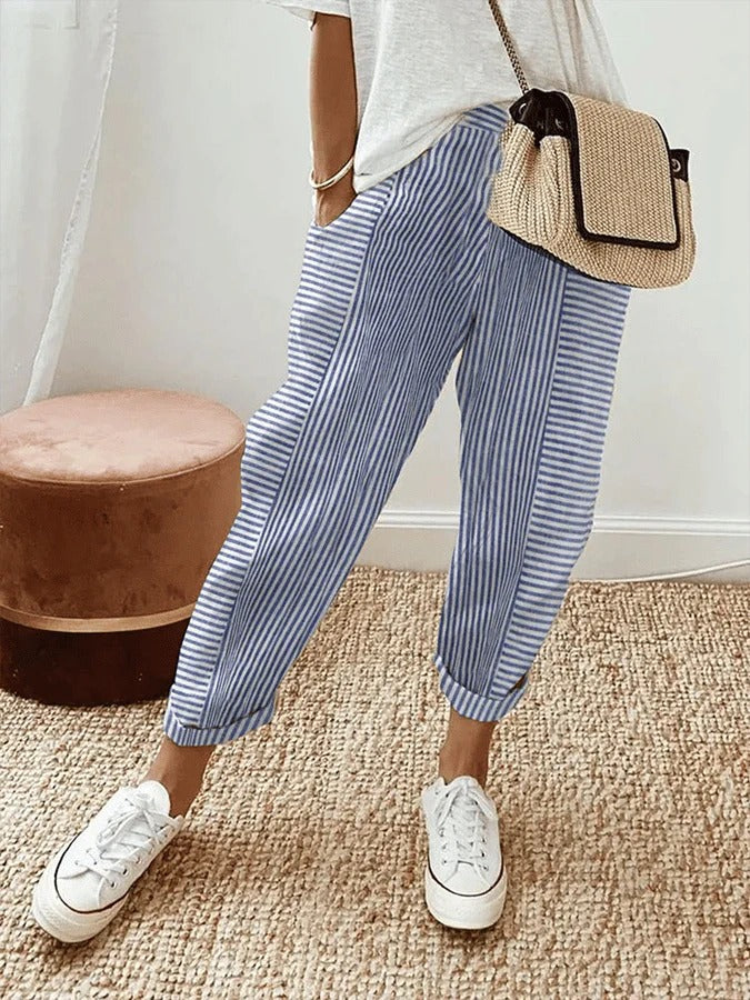 Stylish women's striped drawstring pants with a relaxed fit, perfect for casual wear & everyday comfort.