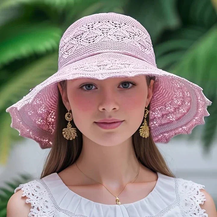 Stylish women's sun hat with elegant lace trim, wide brim, perfect for summer beaches.