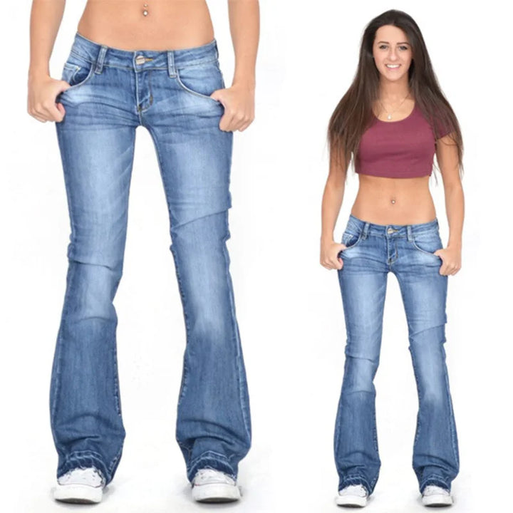 Close-up of women's vintage low-rise flared jeans fabric & stitching, highlighting quality retro details.