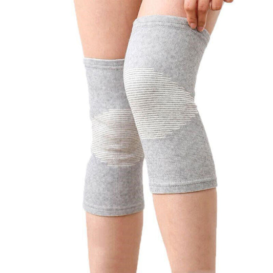 "Supporto ginocchio unisex nero, fascia regolabile e traspirante per comfort e stabilità, dettagli moderni e discreti."