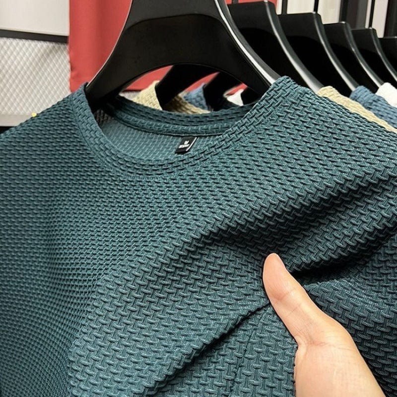 "T-shirt aderente uomo, colore neutro, vestibilità slim, ideale per ogni occasione, tessuto traspirante e confortevole."