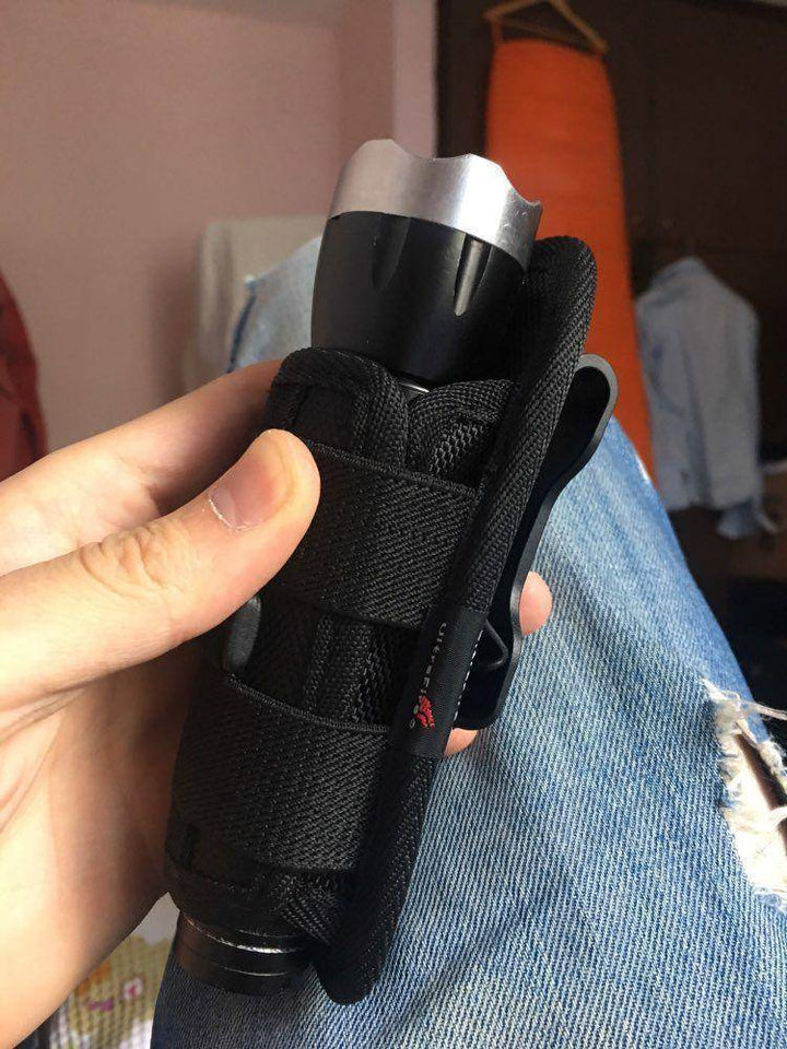 Adjustable 360-degree rotating flashlight holder for tactical gear and hunting
