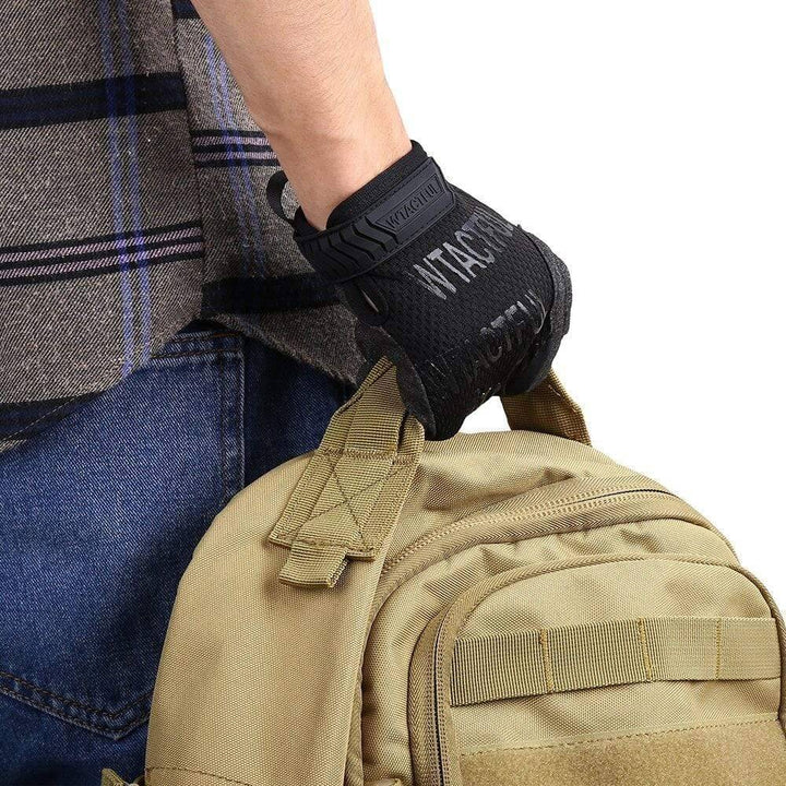 Pair of tactical gloves showing palm grip texture, perfect for hiking, work, and outdoor adventures.