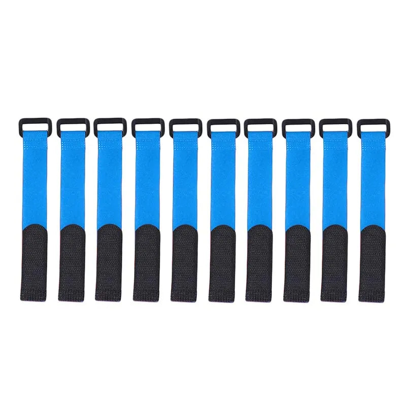 Various fishing rods organized with black adjustable hook and loop tie straps, fishing gear storage