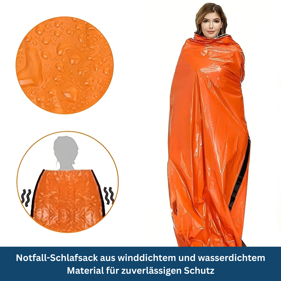 Reusable thermal sleeping bag in bright orange, essential emergency gear for backpacking