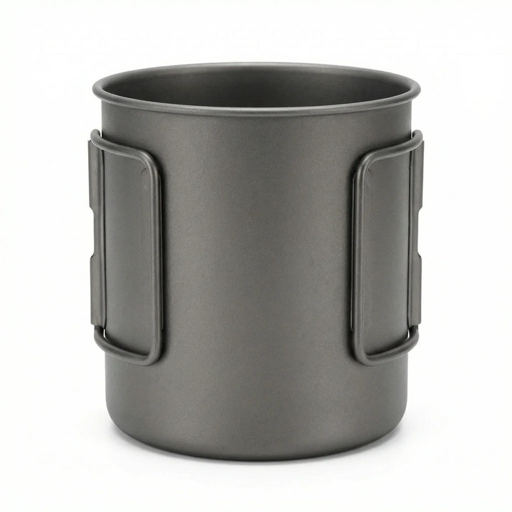 Durable titanium camping mug for outdoor cooking. Features a foldable handle for easy packing.