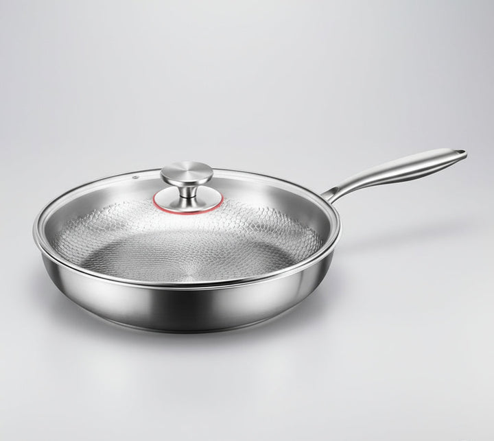 Robust titanium non-stick induction skillet with hammered design, built for long-lasting performance and easy care.
