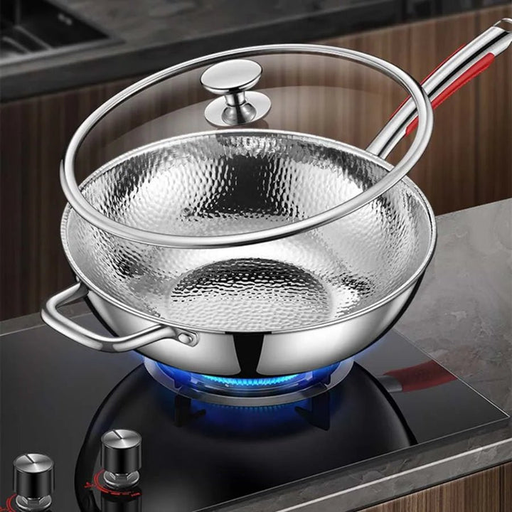Durable titanium round bottom wok for induction cooking. Perfect non-stick cookware for stir-frying.
