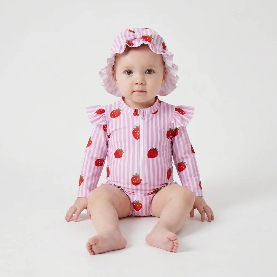 Toddler girls' long-sleeve rashguard swimsuit featuring a cute matching swim hat for ultimate UV protection.