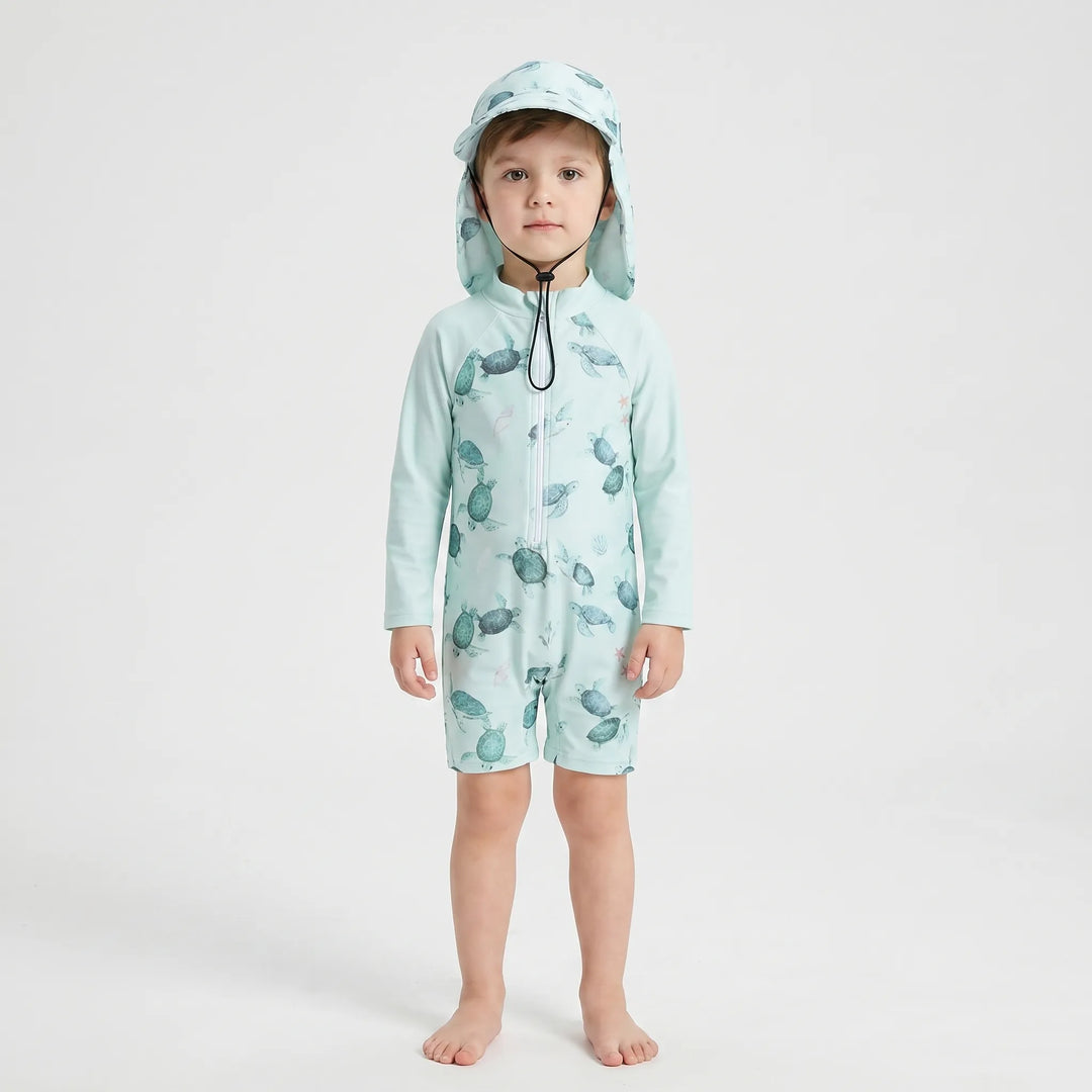 Gender-neutral toddler long-sleeve one-piece swimsuit & sun hat for boys & girls, perfect for summer beach fun.