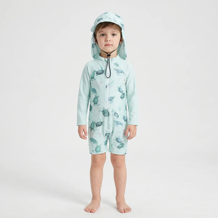 Gender-neutral toddler long-sleeve one-piece swimsuit & sun hat for boys & girls, perfect for summer beach fun.